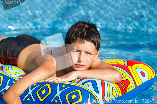 Image of Boy in swimming pool 