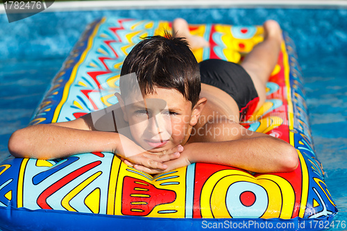 Image of Boy in swimming pool 