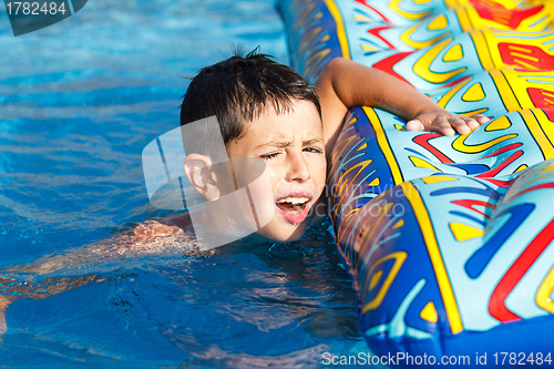 Image of Boy in swimming pool 