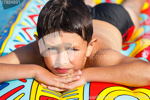 Image of Boy in swimming pool 