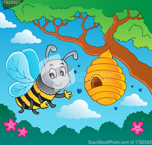 Image of Cartoon bee with hive