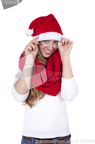 Image of young beautiful woman with red scarf and christmas hat