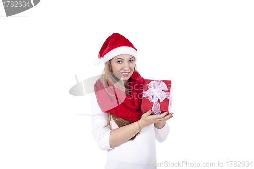 Image of young smiling girl with red hat and present christmas