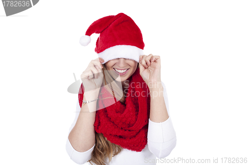 Image of young beautiful woman with red scarf and christmas hat