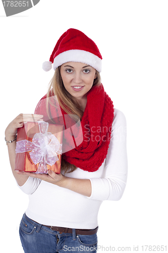 Image of young smiling girl with red hat and present christmas