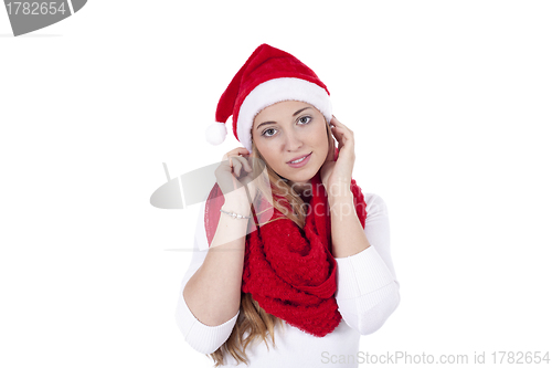 Image of young beautiful woman with red scarf and christmas hat