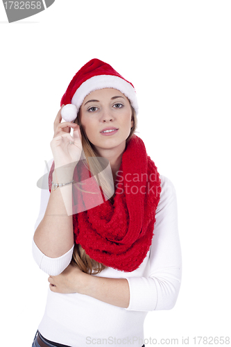 Image of young beautiful woman with red scarf and christmas hat