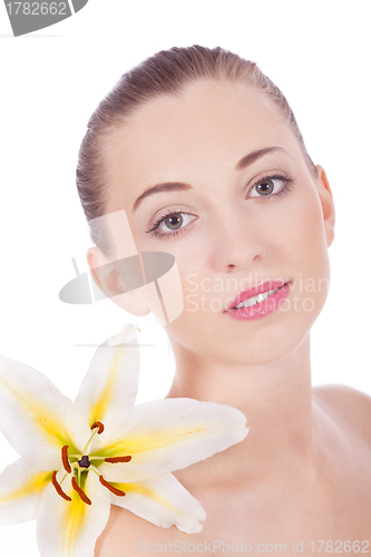 Image of young beautiful woman portrait with white flower