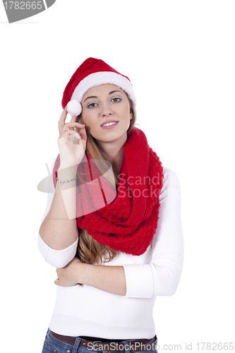 Image of young beautiful woman with red scarf and christmas hat