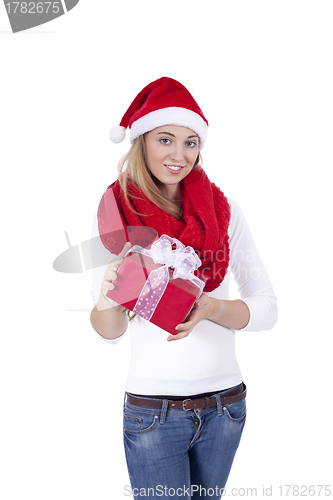 Image of young smiling girl with red hat and present christmas