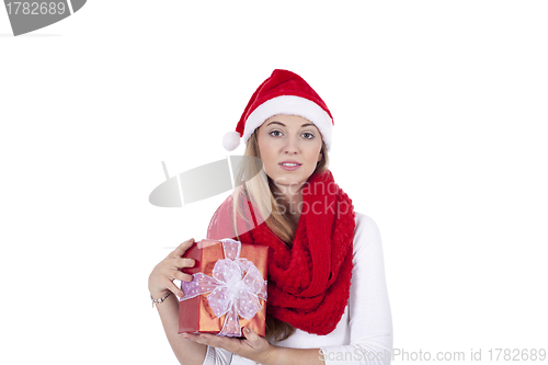 Image of young smiling girl with red hat and present christmas