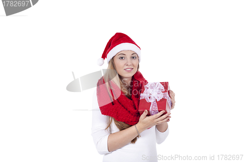 Image of young smiling girl with red hat and present christmas