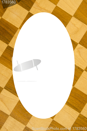 Image of Fragment of checkers or chess board and ehite oval 