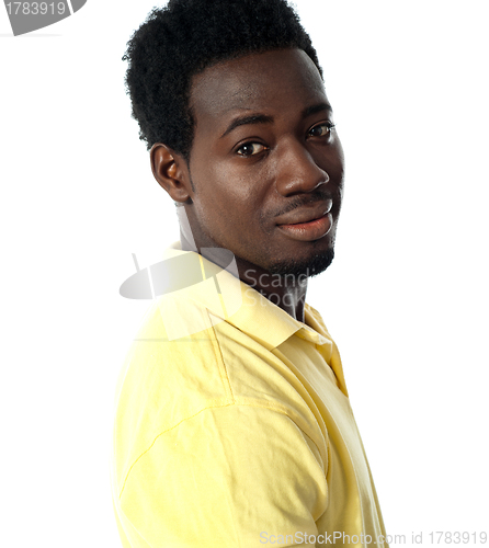 Image of Young african guy posing in casuals
