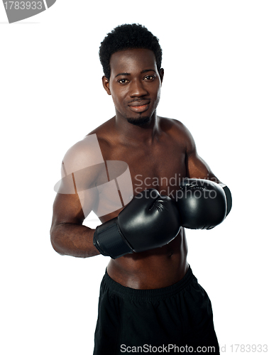 Image of Muscular african boxer posing in style