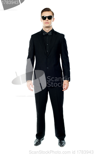 Image of Full length portrait of young man wearing goggles