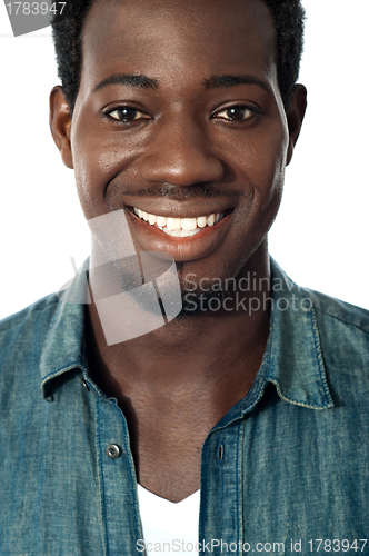 Image of Closeup portrait of smiling black teenager