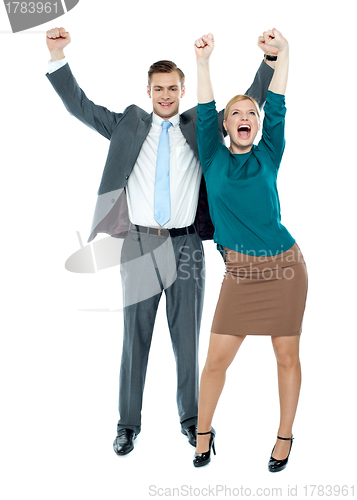 Image of Excited business people celebrating success