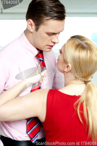 Image of Female secretary forcing boss to love her