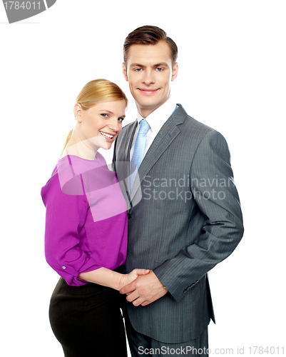 Image of Young business people in love