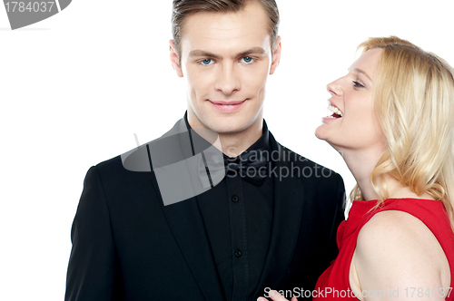 Image of Woman whispering something to her sweetheart