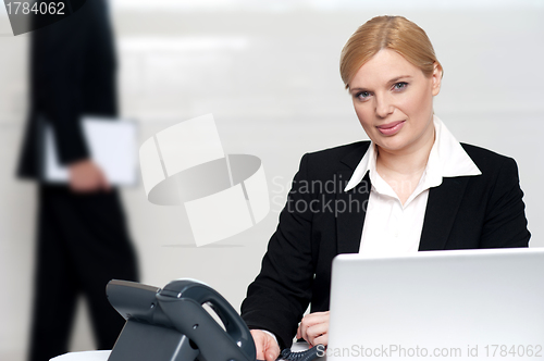 Image of Businesswoman looking at camera