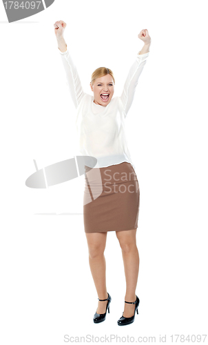 Image of Beautiful blonde female enjoying success