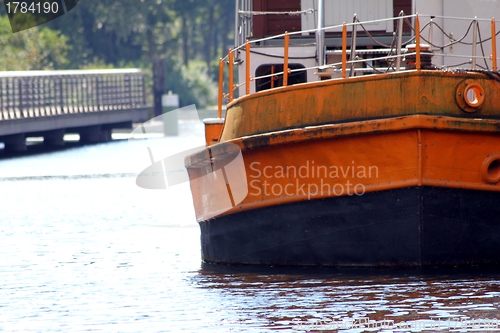 Image of plain ship on a channel