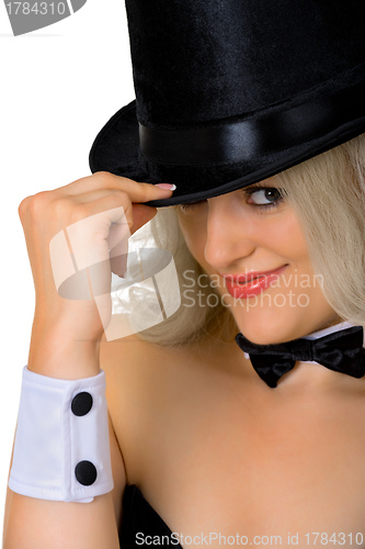 Image of Young girl - dancer in a black hat