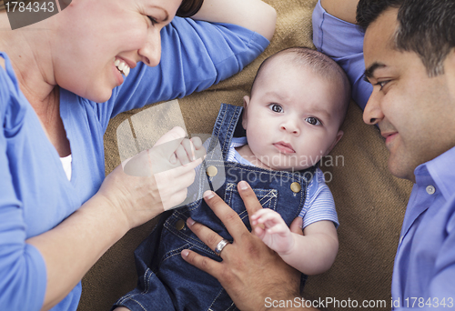 Image of Mixed Race Family Playing on the Blanket