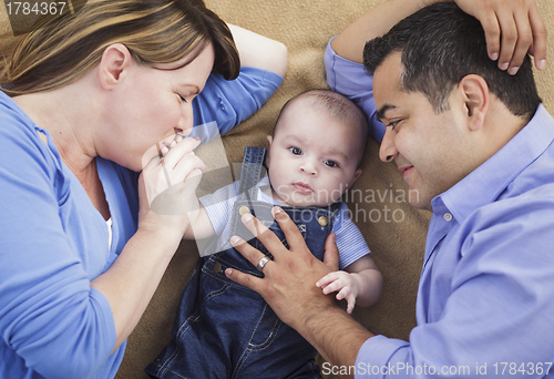 Image of Mixed Race Family Playing on the Blanket