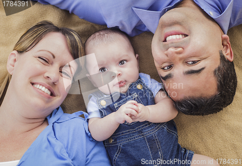 Image of Mixed Race Family Playing on the Blanket