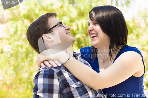 Image of Young Couple Having Fun in the Park