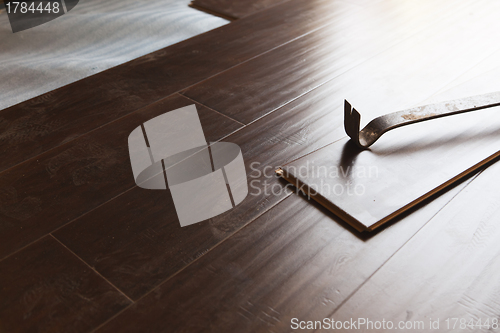 Image of Pry Bar Tool with New Laminate Flooring