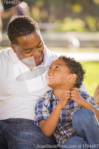 Image of Happy Mixed Race Father and Son Playing