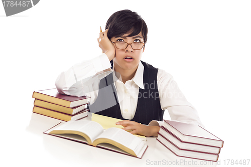 Image of Bored Mixed Race Female Student at Desk with Books