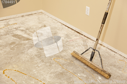 Image of Concrete House Floor with Broom Ready for Flooring Installation