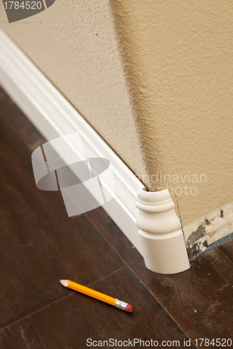 Image of New Baseboard and Bull Nose Corners with Laminate Flooring