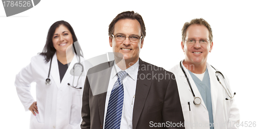 Image of Businessman with Medical Personnel Behind