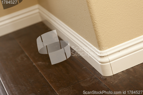 Image of New Baseboard and Bull Nose Corners with Laminate Flooring