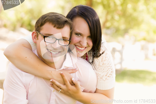 Image of Young Couple Having Fun in the Park