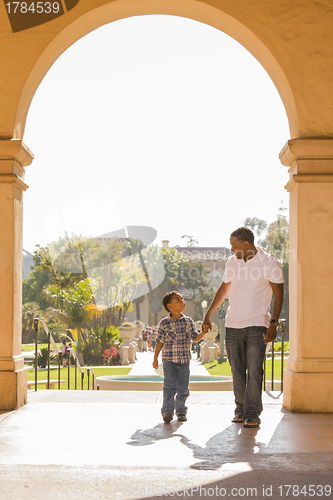 Image of Mixed Race Father and Son Walking in the Park