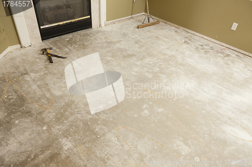 Image of Concrete House Floor with Broom Ready for Flooring Installation