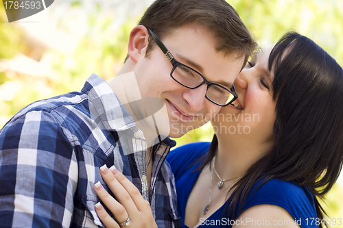 Image of Young Couple Having Fun in the Park