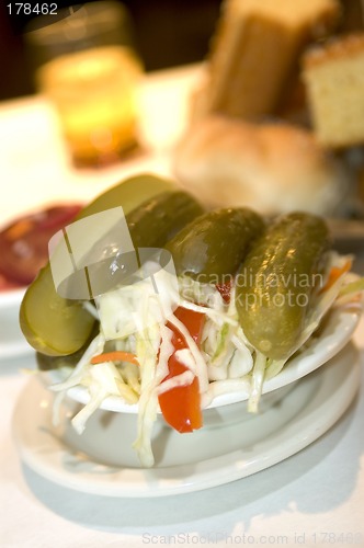 Image of pickles and cole slaw