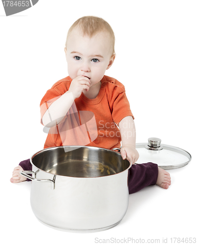 Image of baby with big cooking pot