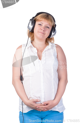 Image of Pregnant Woman with Headphones
