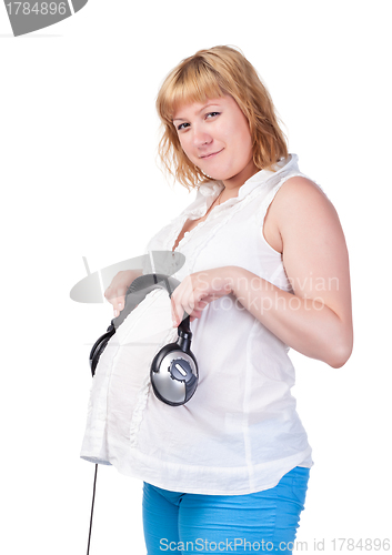 Image of Pregnant Woman with Headphones