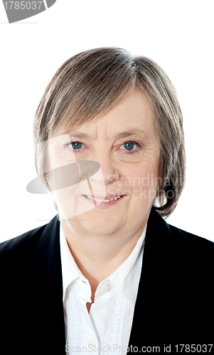 Image of Closeup portrait of smiling old businesswoman