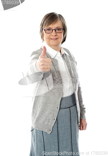 Image of Old lady showing thumbs up gesture